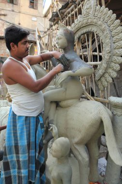 Heykel yapan adam, kumuli çömlekçiler sokağı, kolkata, batı bengal, Hindistan, Asya