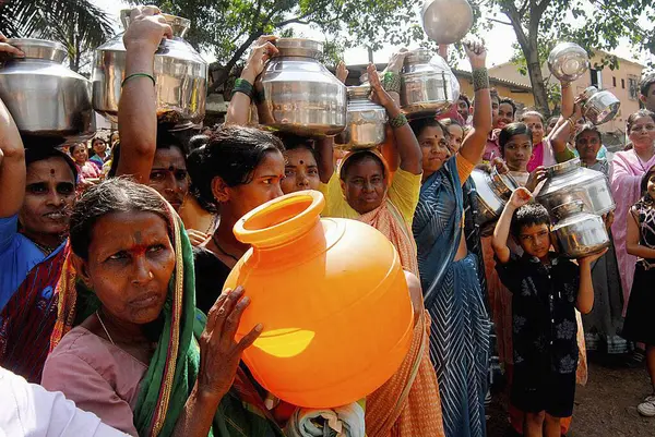 stock image Women with their stainless steel water containers to protest against the acute water shortage in Bombay now Mumbai, Maharashtra, India 