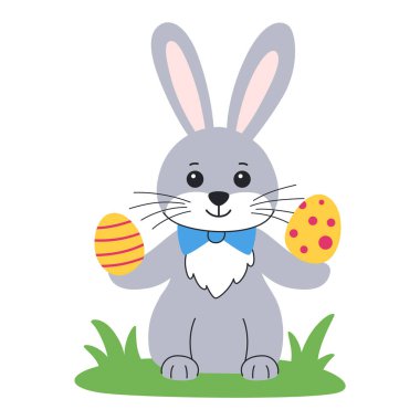 Paskalya tavşanı her pençesinde yumurta tutuyor, çimlerin üzerinde oturuyor. Beyaz arka planda izole edilmiş. Paskalya ögesi.