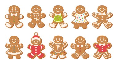 Zencefilli çörekler. Süslü Noel kurabiyeleri ve krema ve şekerleme serpiştirme desenleri. Beyaz arkaplanda izole.