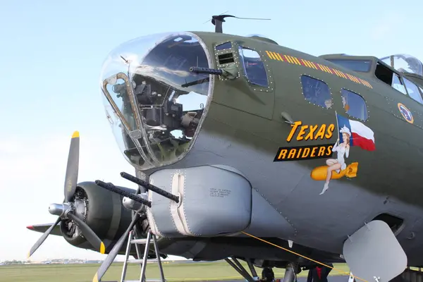 stock image New Orleans, LA, USA, October 27, 2017: Close up of front fuselage of aircraft Texas Raiders B17 G-95, Boeing vintage bomber. Texas raiders nose art. Most iconic American military aircraft at WW II Air, Sea and Land Festival 2017 at Lakefront Airport