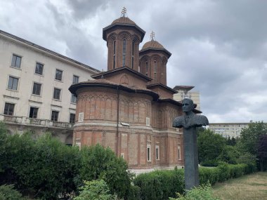 Bucharest, Romania, July 3, 2024: Kretzulescu Church Eastern Orthodox church in Brncovenesc style. Bust of Corneliu Coposu, a Christian Democratic and liberal conservative Romanian politician. Political detained during communist regime. clipart