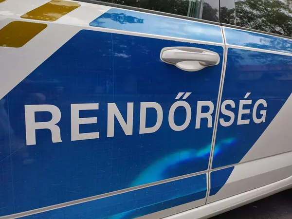 stock image Keszthely, Hungary, August 8, 2024: Detail of side of Hungarian police patrol car. Labeled Rendrsg (police). National civil law enforcement agency of Hungary. Governed by the Interior Ministry.