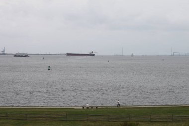 Baltimore, Maryland, USA - September 17, 2024: Mouth of Patapsco river viewed from Fort McHenry National Monument and Historic Shrine. Pylons of colapsed Francis Scott Key Bridge in background. clipart