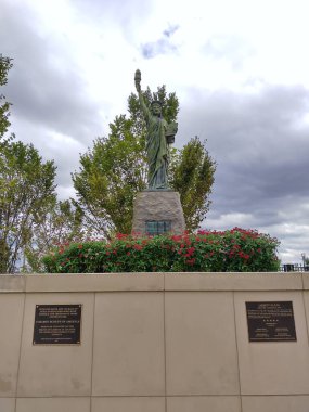 Atlanta, GA, USA - September 28, 2024: Replica of Statue of Liberty located at Liberty Plaza across  Georgia State Capitol. Gifted to the city of Atlanta in 1951 by The Boy Scouts of America. Vertical clipart