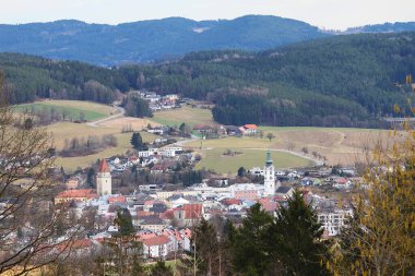 Freistadt, Austria - March 12, 2025: Scenic view from St. Peter to old town Freistadt: Parish Church of Saint Catherine, Castle Freistadt with Bergfried and Salzhof. Landscape in region Muehlviertel.