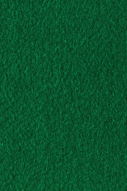 Yeşil renk tekstil kumaş kumaş dokusu arkaplanı. Soyut tek renkli koyu mavi renk keçeli arka plan.