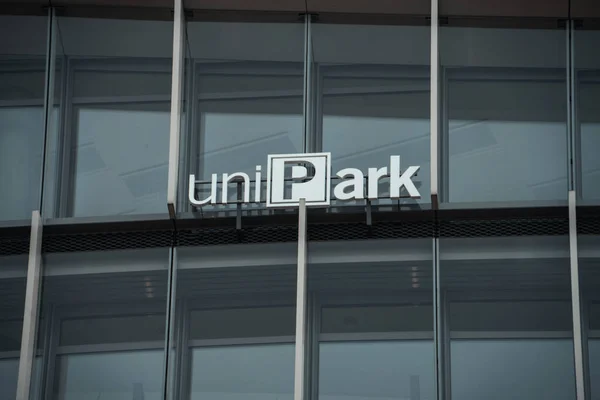 stock image Vilnius, Lithuania - November 9, 2022: Unipark logo sign on modern office wall. Unipark company provides parking services at airports, shopping, business centers, streets in Baltic States and Poland.