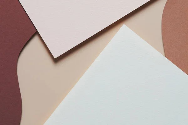 stock image Abstract colored paper texture background. Minimal paper cut style composition with layers of geometric shapes and lines in shades of beige and brown colors. Top view, copy space