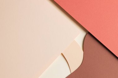 Soyut renkli kağıt dokusu arkaplanı. Minimum kağıt, bej ve kahverengi tonlarında geometrik şekil ve çizgilerin katmanları ile tarz kompozisyonu keser. Üst görünüm, alanı kopyala