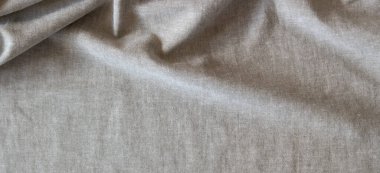 Soyut buruşmuş keten kumaş dokusu arka planı. Doğal katı keten organik eko tekstil tuval arka planı. Üst görünüm, alanı kopyala