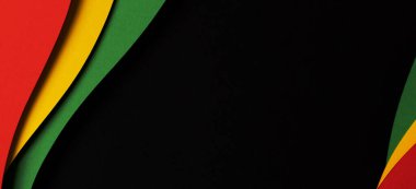 Soyut geometrik siyah, kırmızı, sarı, yeşil renk arkaplan. Metin için kopyalama alanı olan Siyah Geçmiş Ay renk arkaplanı.