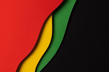 Soyut geometrik siyah, kırmızı, sarı, yeşil renk arkaplan. Metin için kopyalama alanı olan Siyah Geçmiş Ay renk arkaplanı.