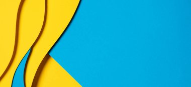 Abstract colored paper texture background. Minimal paper cut composition with layers of geometric shapes and lines in light blue, yellow colors.