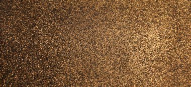 Abstract gold brown glitter texture background.
