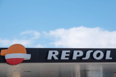 Finestrat, Spain - March 2, 2023: Repsol logo sign on gas station. Repsol - Spanish energy and petrochemical company that develops, produces and markets lubricants, oil-based specialized products.