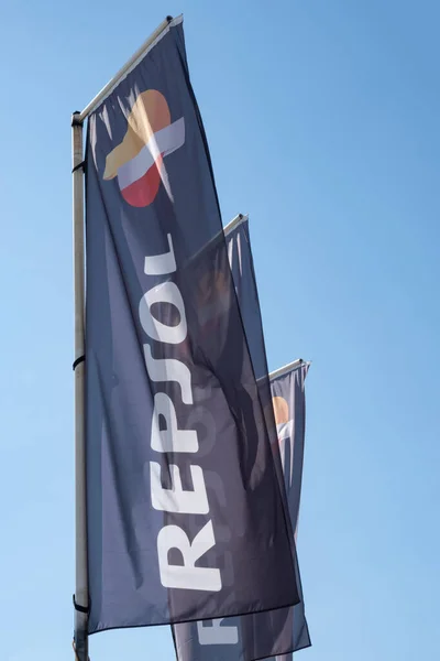Vertical Hanging Blue Fabric Banner Flag Repsol Logo Sign Repsol — Stockfoto