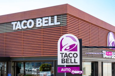 Finestrat, Spain - March 2, 2023: Taco Bell restaurant. American-based chain of fast food restaurants, witch serve variety of Mexican-inspired foods,including tacos, burritos, quesadillas, nachos.