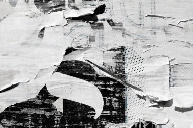 Old grunge torn collage urban street posters creased crumpled paper placard texture background. Ripped faded paper backdrop surface placard.