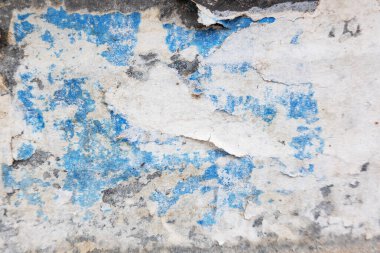 Old grunge torn collage urban street posters creased crumpled paper placard texture background. Ripped faded paper backdrop surface placard.