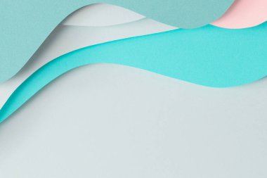 Soyut renkli kağıt dokusu arkaplanı. Kağıt kesim kompozisyonu geometrik şekil katmanları ve turkuaz, akuamarin, pastel yeşil ve pembe renkli çizgiler. Üst görünüm, alanı kopyala