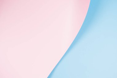 Soyut pembe ve açık mavi kağıt dalgası. Işık ve gölgeli yaratıcı geometrik kavisli kağıt. Kopya alanı ile soyut geometri arkaplanı.