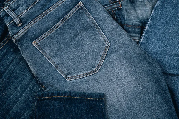Denim Pozadí Hromada Modrých Džínů Různé Ležérní Kalhoty Oblečení Horní — Stock fotografie