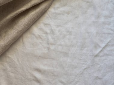 Soyut keten kumaş dokusu arka planı. Doğal açık kahverengi renkli keten ve beyaz renkli harmanlanmış keten kumaş arka plan. Üst görünüm.
