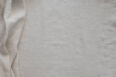 Soyut keten kumaş dokusu arka planı. Doğal açık kahverengi renkli keten kumaş arka planı. Üst görünüm.