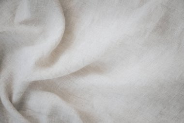 Soyut keten kumaş dokusu arka planı. Kumaşlı doğal beyaz kumaş arka plan. Üst görünüm, alanı kopyala.