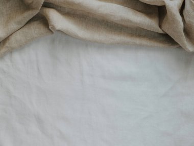 Soyut keten kumaş dokusu arka planı. Doğal açık kahverengi renkli keten ve beyaz renkli harmanlanmış keten kumaş arka plan. Üst görünüm.