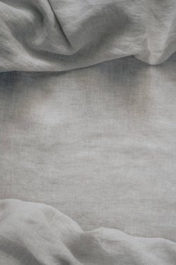 Soyut keten kumaş dokusu arka planı. Doğal açık kahverengi renkli keten kumaş arka planı. Üst görünüm.