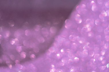 Soyut bokeh arkaplanı. Pembe morumsu renkler bulanık ışıklar gölge çizgileri ile bokeh arkaplan.