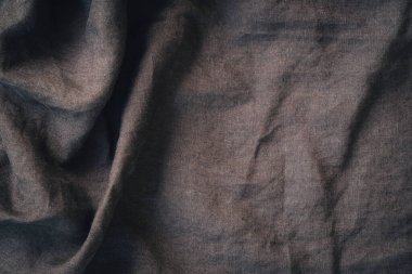 Soyut keten kumaş dokusu arka planı. Doğal açık kahverengi renkli keten kumaş arka planı. Üst görünüm.