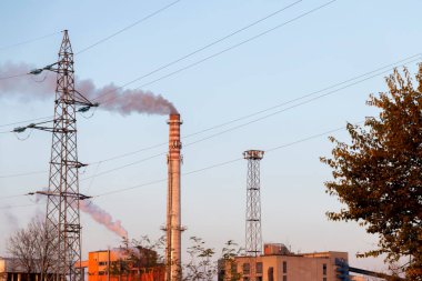 Raw coal drying in a factory. Belts for transport to the thermal power plant. Smoke pollutes the environment. clipart