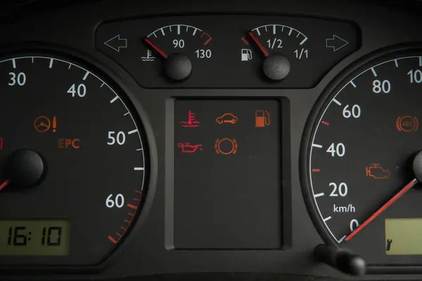 Car speedometer - auto Dashboard with low fuel gauge and error lights