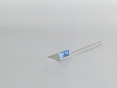 Close-up of a new toothbrush isolated on a white background. Copy space