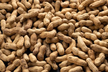 Kuru kabuksuz fıstıkların arka planı, üst manzara, yakın plan.