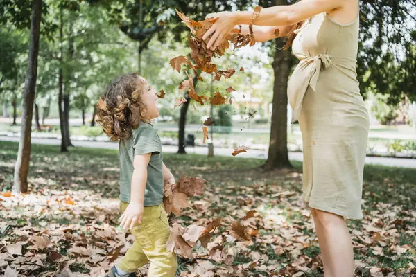 Happy Child Mom Playing Dry Leaves Park Sunny Day — Stock Photo, Image