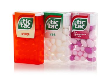 BUCHAREST, ROMANIA - APRIL 1, 2019. Tic Tac Mint, Orange and Strawberry Mix isolated on white. Tic Tac is a brand of small, hard mints clipart