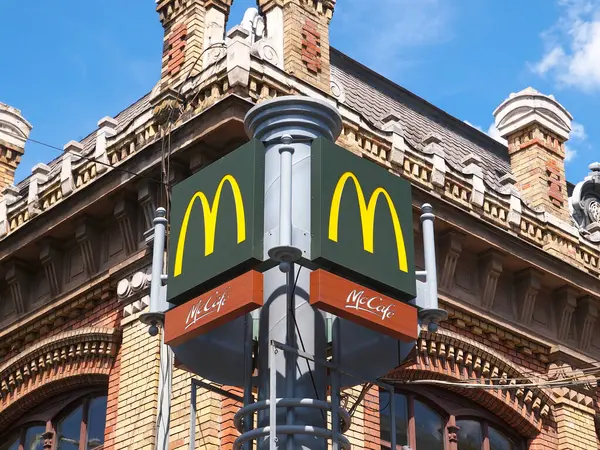 stock image BUDAPEST, HUNGARY - AUGUST 14, 2019. McDonalds restaurant logo with McCafe sign in Budapest. 