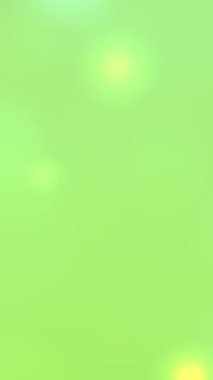 yeşil renkli dikey video yavaş hareket eden simli parçacıklar, arka plan narin ve doğayı çağrıştırıyor