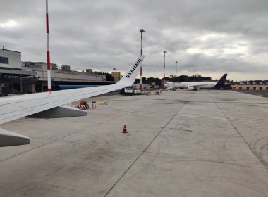Rome, Lazio, Italy - January 5, 2023: Ciampino airport from the window of the Ryanair plane during departure
