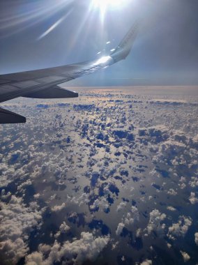 Rome, Lazio, Italy - January 5, 2023: Panoramic glimpse of the Lazio coast from the window of the Ryanair plane that has just taken off from Ciampino