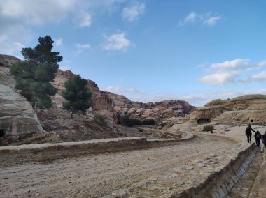 Petra, Jordan - January 7, 2023: Tomb of the Obelisk along the initial stretch of the access path to the 7th century BC Nabataean archaeological site, a Unesco heritage site