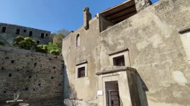 Ischia, Campania, Italy  May 12, 2022: Overview of the Bourbon Prison at the Aragonese Castle from the access courtyard