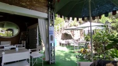 Forio, Campania, Italy  May 14, 2022: Overview of the bar at Giardini La Mortella