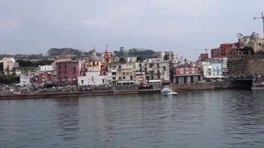 Pozzuoli, Campania, Italy  October 2, 2021: Overview of the village from the ferry entering the port