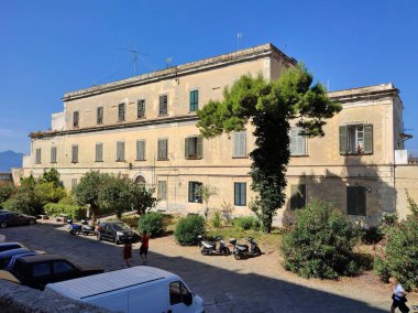 Procida, Campania, Italy  October 1, 2021: The 19th century Guards Pavilion overlooking Piazza d'Armi in the medieval village of Terra Murata clipart