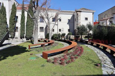 Benevento, Campania, Italy  15 February 2024: Hortus Conclusus, the garden of the thirteenth-century Convent of San Domenico, now a university building, which has hosted works by the artist Mimmo Paladino since 1992. clipart